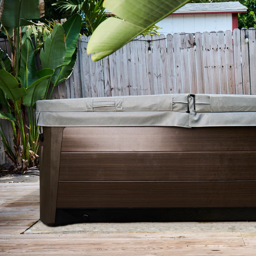 Marine-grade vinyl replacement cover fitted to an outdoor hot tub